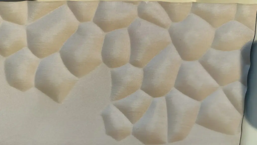 CNC-gefräste 3D-Designoberfläche mit kissenartiger Wabenstruktur – Tischlerei Cluse